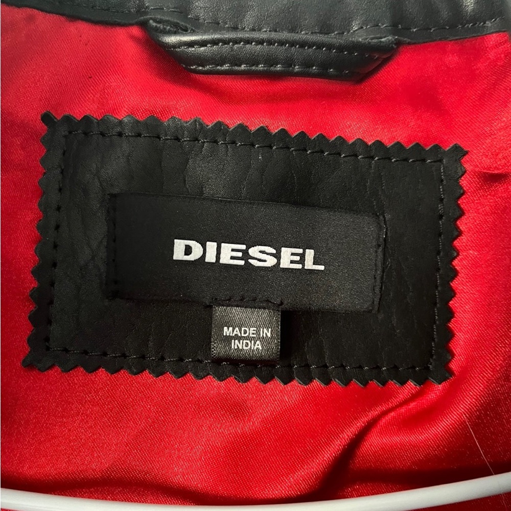 NWOT Diesel leather jacket Size M. Yes. You will shine